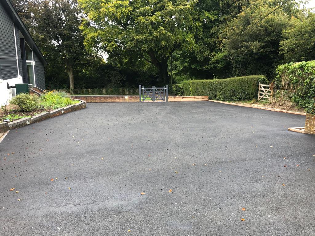 This is a photo of a bitumen driveway which is in the process of being installed by Barossa Road Valley Tech SA